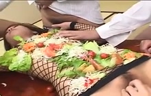 Japanese girl used as a table